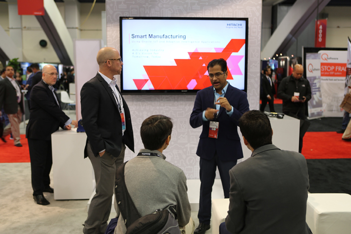 Rajender Yaski, Director Oracle Consulting Services, Hitachi Consulting and Viktor Sahakian, Vice President of Oracle Technology, Hitachi Consulting present Smart Manufacturing for Oracle solution at Hitachi Group booth in Exhibit Hall during Oracle OpenWorld 2018